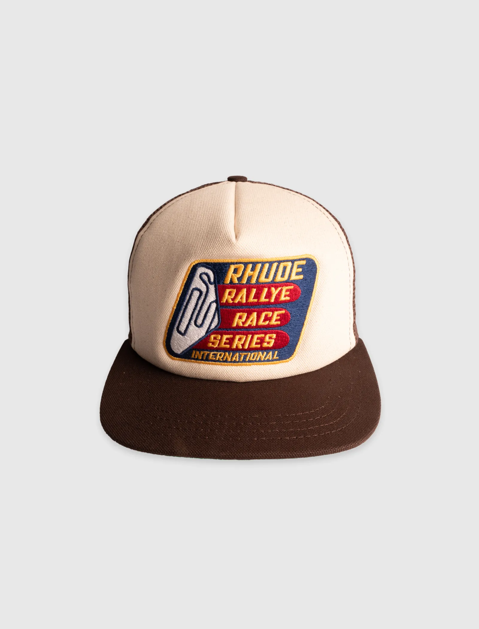 RHUDE RACE SERIES WASHED TRUCKER HAT   BROWN